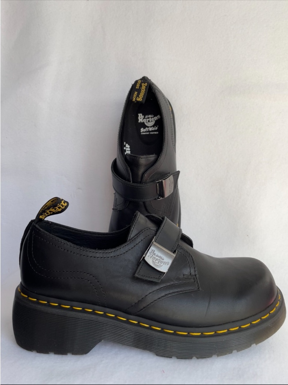 Dr. Martens womens
Black Leather Strap Platform Loafers with Yellow Stitching